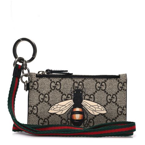 gucci supreme bee key case